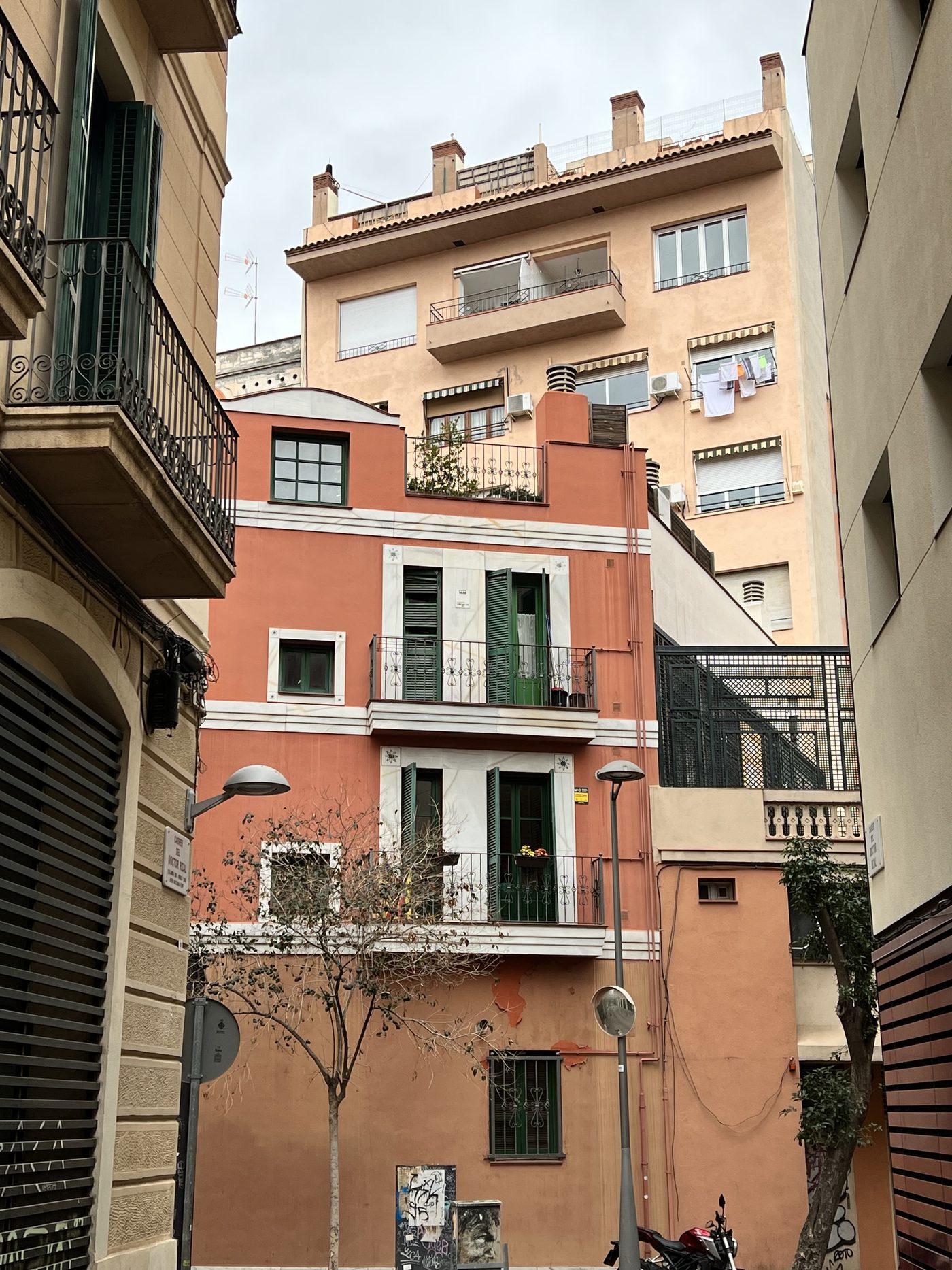 Pastel-coloured apartment buildings in a Barcelona neighbourhood
