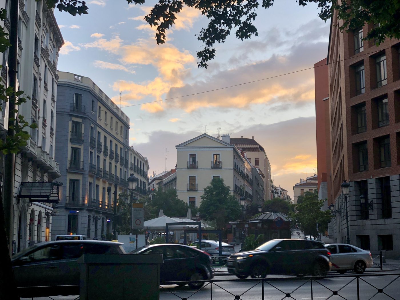 A quiet residential street in Madrid at sunset